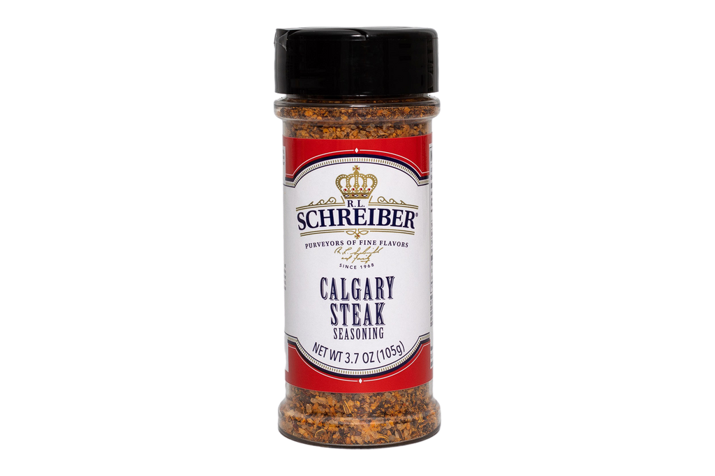 A bottle of RL Schreiber's Calgary Steak Seasoning with a black cap and a red and white label, shown on a plain white background.